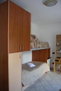 Postel nebo postele na pokoji v ubytování Residenza Il Conte + 29 fotografií