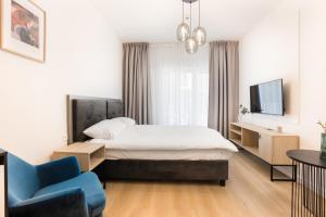 Aparthotel City Break Plac Wolności 6客房内的一张或多张床位