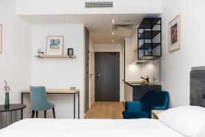 Aparthotel City Break Plac Wolności 6客房内的一张或多张床位