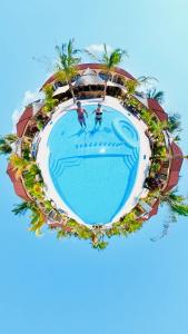 an aerial view of an island with a swimming pool at Paje Blu Boutique Hotel in Paje