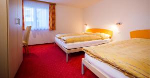 Postel nebo postele na pokoji v ubytování ABA-Sporting Apartment House
