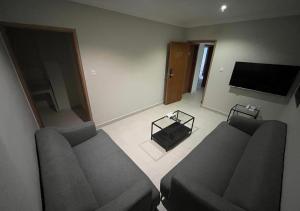 TV o dispositivi per l'intrattenimento presso Times Square Suite Hotel