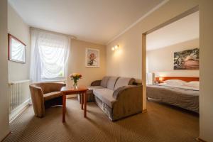 Posteľ alebo postele v izbe v ubytovaní Hotel Gromada Łomża + 37 fotografií