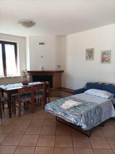 מיטה או מיטות בחדר ב-La casetta di Rosa