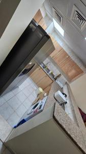 an overhead view of a kitchen with a sink at Al Ahmer Apartments in Dubai