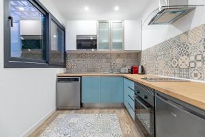 Kuchyňa alebo kuchynka v ubytovaní ApartUP Ruzafa Vertical