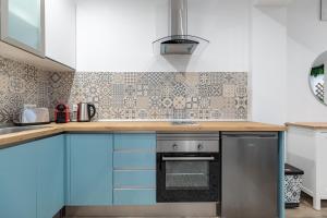 Kuchyňa alebo kuchynka v ubytovaní ApartUP Ruzafa Vertical