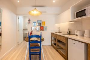 Кухня или мини-кухня в Dodo Square Residence
