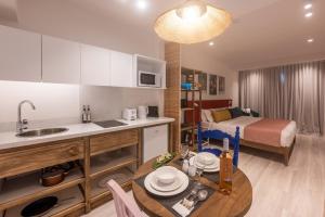 Кухня или мини-кухня в Dodo Square Residence
