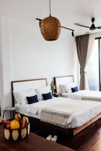 Ліжко або ліжка в номері Ananda's