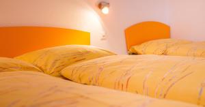 Postel nebo postele na pokoji v ubytování ABA-Sporting Apartment House
