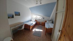 Postel nebo postele na pokoji v ubytování Ferienhaus Gundelsby