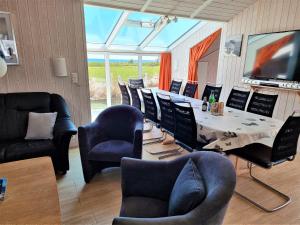 Μια τηλεόραση ή/και κέντρο ψυχαγωγίας στο Ferienhaus Nordlicht