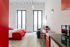 Posteľ alebo postele v izbe v ubytovaní Apartamentos Tito San Nicolas