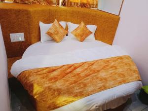 Postel nebo postele na pokoji v ubytování Hotel Maan Palace