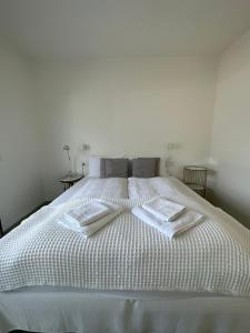 Postel nebo postele na pokoji v ubytování Merano Absolute View + 4 fotografie