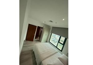 Letto o letti in una camera di Times Square Suite Hotel