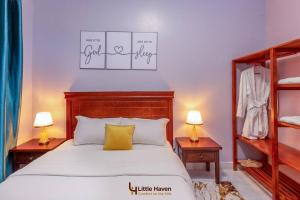 Una cama o camas en una habitación de Little Haven