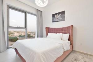 Postel nebo postele na pokoji v ubytování Gorgeous 2BR Apartment in Downtown - Dubai