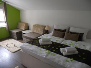 Postel nebo postele na pokoji v ubytování Apple Line Appartments
