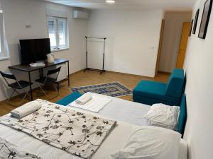 Postel nebo postele na pokoji v ubytování Apple Line Appartments