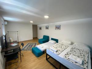 Postel nebo postele na pokoji v ubytování Apple Line Appartments