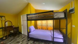 Postel nebo postele na pokoji v ubytování Nokkamin Home Chiang Dao