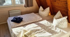 Katil atau katil-katil dalam bilik di Ferienhaus Traumstrand