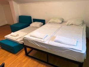 Postel nebo postele na pokoji v ubytování Apple Line Appartments