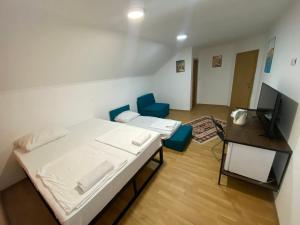 Postel nebo postele na pokoji v ubytování Apple Line Appartments