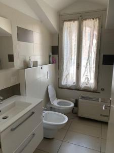Koupelna v ubytování Casa Rino: Vacanze in casetta......