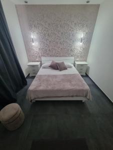 Postel nebo postele na pokoji v ubytování VILLA STELLA LUXURY IN SICILY with swimming pool for exclusive use