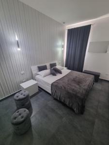 Postel nebo postele na pokoji v ubytování VILLA STELLA LUXURY IN SICILY with swimming pool for exclusive use