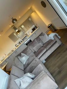 an overhead view of a living room with a couch at Flat in the Heart of Chelmsford in Chelmsford