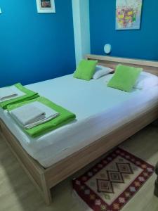 Postel nebo postele na pokoji v ubytování Apple Line Appartments