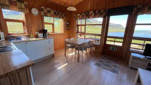 Una cocina o kitchenette en Hálsabol Sumarhús- with hot tube