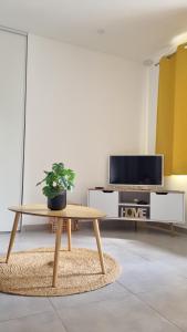 Posedenie v ubytovaní Le 36 - Maison COSY - Jardin privatif