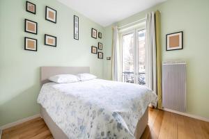 Posteľ alebo postele v izbe v ubytovaní Luxury style appartement, Arc de Triomphe - Champs Elysées