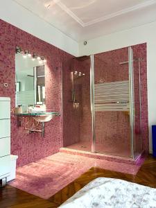 a bathroom with a walk in shower in a room at Luxury style appartement, Arc de Triomphe - Champs Elysées in Paris