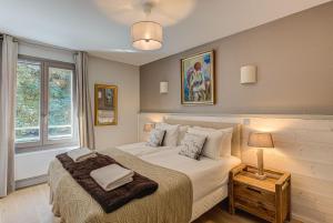 Posteľ alebo postele v izbe v ubytovaní White Pearl A13 - Alpes Travel - Central Chamonix (Sleeps 6)