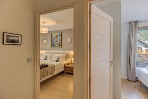Posteľ alebo postele v izbe v ubytovaní White Pearl A13 - Alpes Travel - Central Chamonix (Sleeps 6)