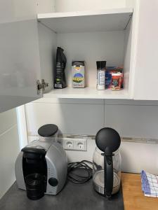 a kitchen with a coffee maker and a blender at City Apartment Bad Säckingen mit Parkplatz in Bad Säckingen