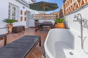 Patio lub wspólna przestrzeń na świeżym powietrzu w obiekcie Ohliving Maestranza