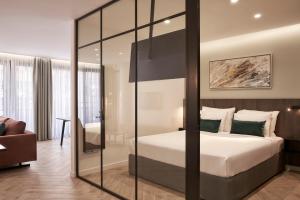 A bed or beds in a room at Hestia - Dimitressa 4