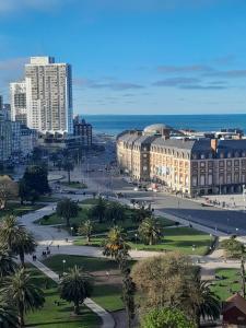 a view of a city with palm trees and buildings at Jorge ll in Mar del Plata