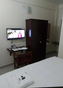 TV at/o entertainment center sa Masterkey properties