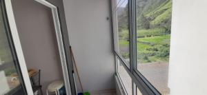 a window in a room with a view of a street at Apartamento Santos in Ribeira Grande