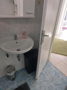Kúpeľňa v ubytovaní Apartman Antonić M