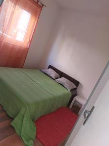 Posteľ alebo postele v izbe v ubytovaní Apartman Antonić M
