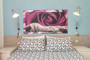 Ένα ή περισσότερα κρεβάτια σε δωμάτιο στο B 104 Puntavilla Mare +13 φωτογραφίες